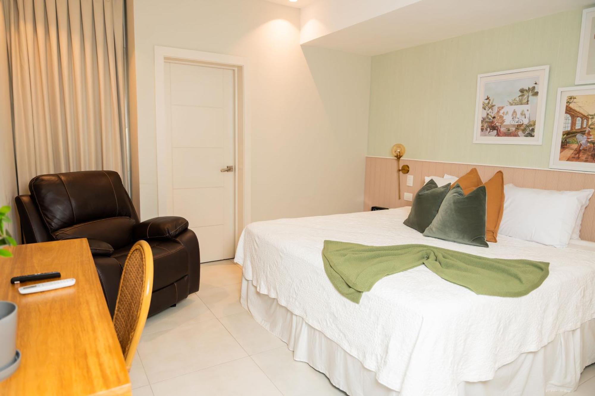 Hotel Stay Here Suites Santo Domingo Exterior photo