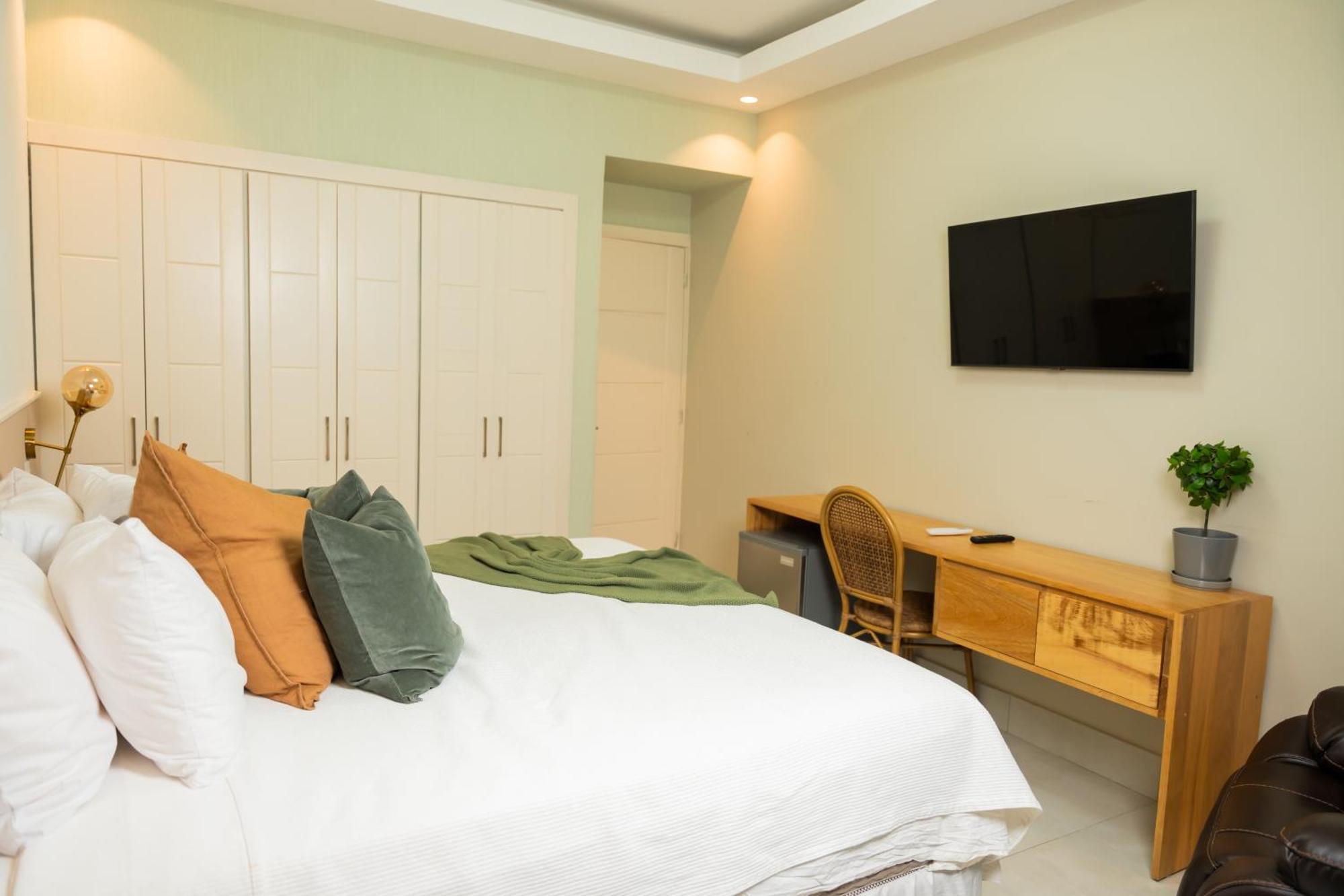 Hotel Stay Here Suites Santo Domingo Exterior photo