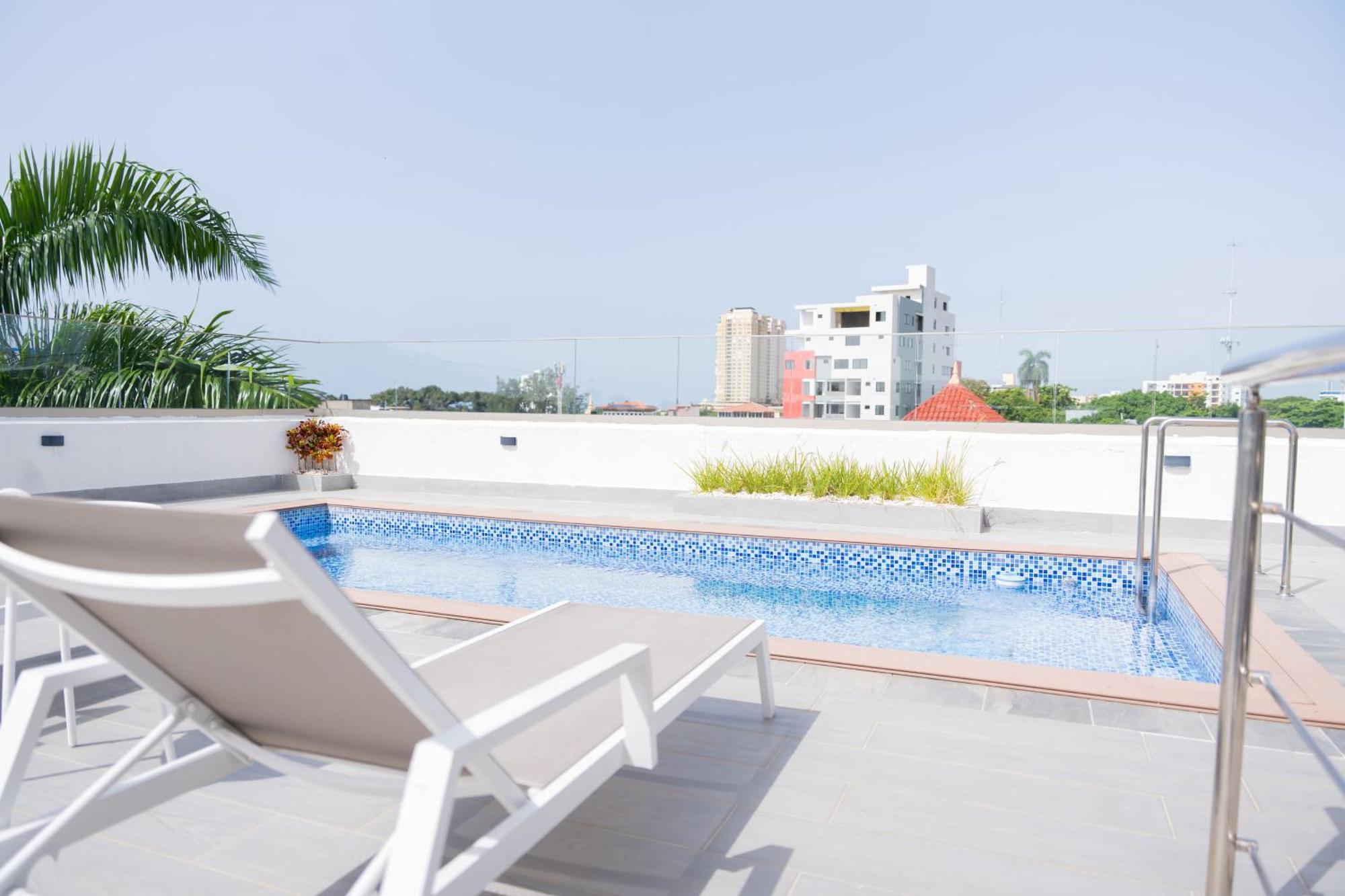 Hotel Stay Here Suites Santo Domingo Exterior photo
