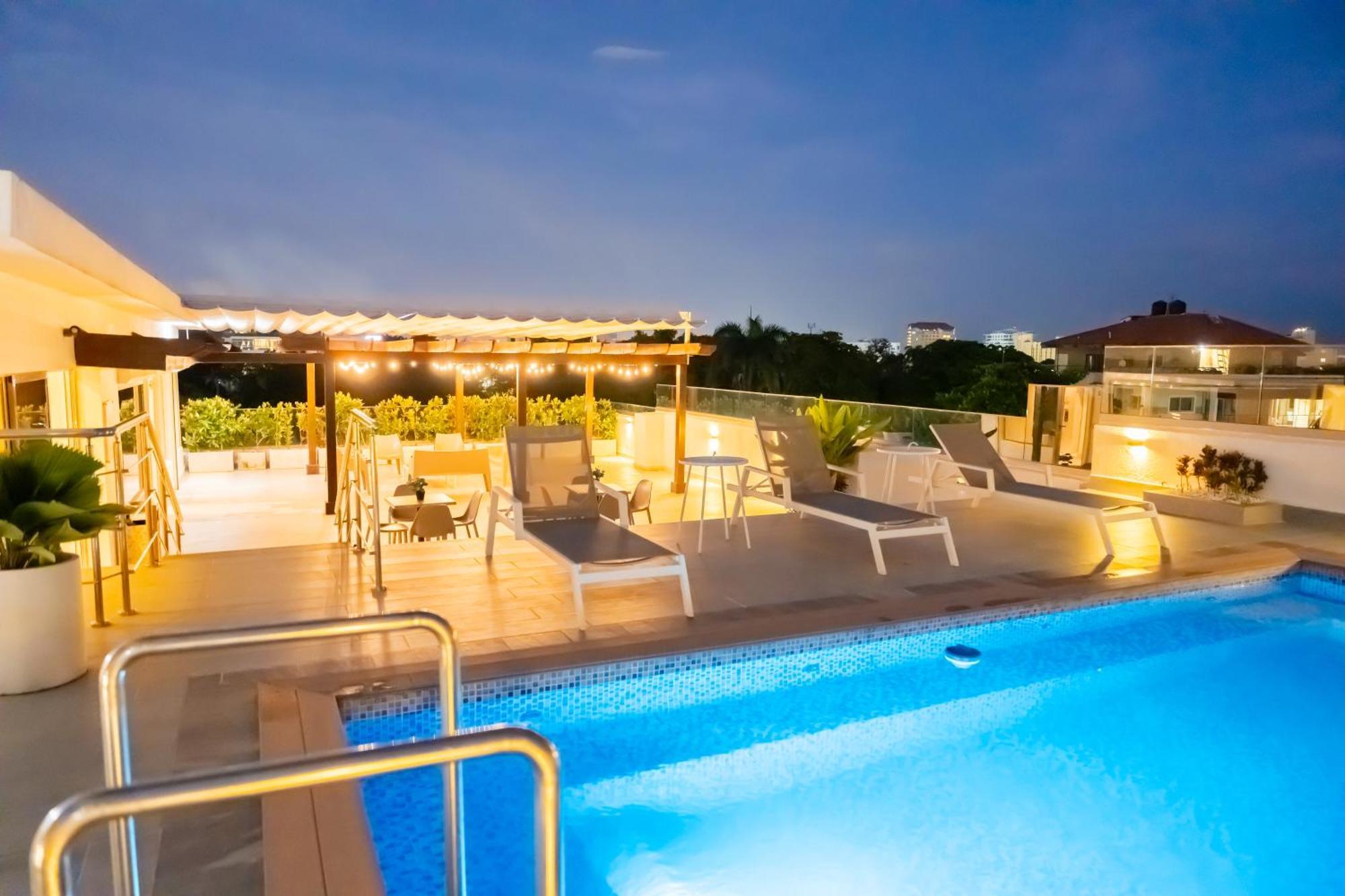 Hotel Stay Here Suites Santo Domingo Exterior photo