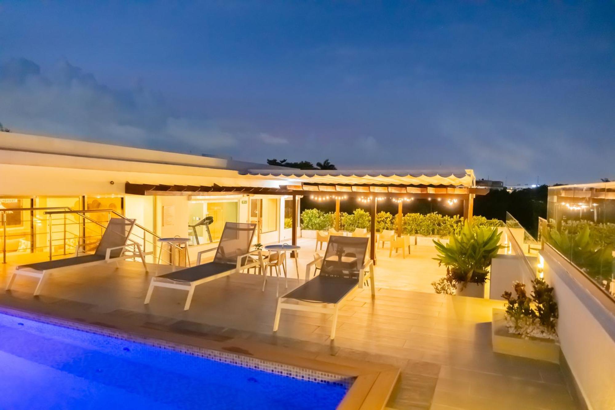Hotel Stay Here Suites Santo Domingo Exterior photo